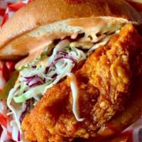 Nashville Hot Sando  · Nashville hot fried chicken topped with comeback sauces and vinegar slaw and pickles. Choose...
