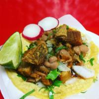 Tacos de Chicharron · Onion, Cilantro, Red Salsa, Beans.