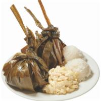 Pork Lau Lau · An old Hawaiian tradition. Hefty pork chunk wrapped with taro leaf and streamed to perfection.