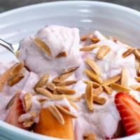 Greek Yogurt & Fruit Bowl · fresh-cut seasonal fruit, Greek yogurt, honey & toasted almonds