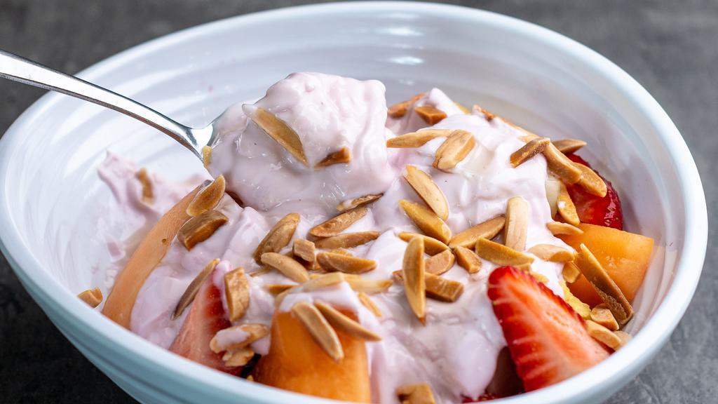 Greek Yogurt & Fruit Bowl · fresh-cut seasonal fruit, Greek yogurt, honey & toasted almonds
