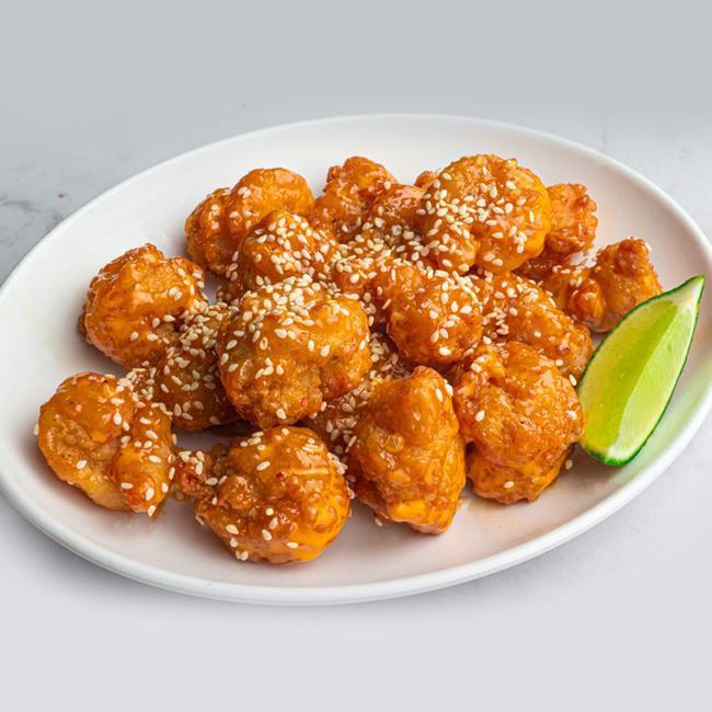 Firecracker Shrimp · A Hurricane favorite. Shrimp lightly battered, fried and delicately tossed in our sweet'n'spicy firecracker sauce, finished with sesame seeds. (970 cal.)