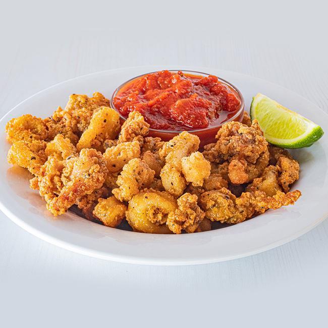 Riptide Calamari · Get ready for a flavor wave. Lightly breaded and fried calamari served with marinara sauce for dipping. (970 cal.)
