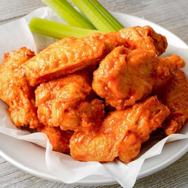 15 Wings · 15 Jumbo Bone-In Wings tossed in your choice of up to 2 sauces.  Served with celery and ranch or bleu cheese dressing for dipping.  (1950-3060 cal)
