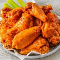 20 Wings · 20 Jumbo Bone-In Wings tossed in your choice of up to 2 sauces.  Served with celery and ranc...