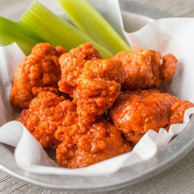 5 Boneless · 5 Boneless Wings tossed in your choice of sauce.  Served with celery and ranch or bleu cheese dressing for dipping.  (780-1180 cal)