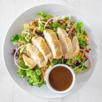 Hurricane Chicken Salad · Our signature salad features your choice of grilled or crispy chicken on a bed of mixed gree...
