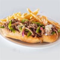 Steak Philly · Thinly sliced steak stacked high on a toasted hoagie roll with peppers and onions and melted...