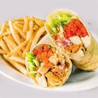 Cancun Chicken Wrap · Grilled or crispy diced chicken breast, shredded cheddar jack cheese, lettuce, tomatoes and ...