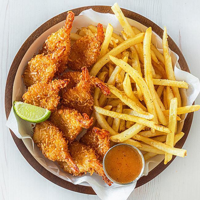 Coconut Shrimp · Our famous coconut crusted jumbo shrimp is served with spicy coco loco sauce for dipping. Served with two sides. (1170-1710 cal.)