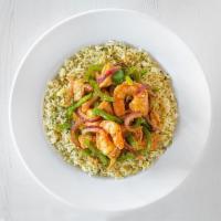 Calypso Seafood Bowl · This goddess bowl features cajun seasoned shrimp and mahi mahi sauteed with onions and peppe...