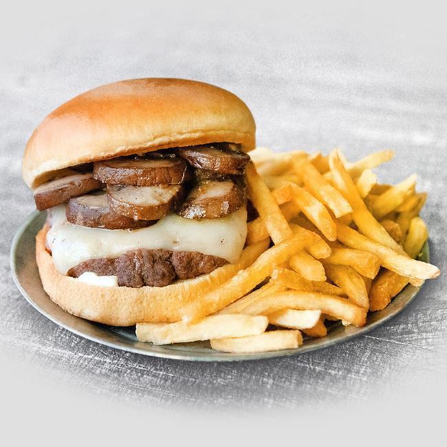 Mushroom Swiss Burger · Our hearty half pound burger boasts a perfectly balanced flavor profile with sauteed mushrooms, mild Swiss cheese and creamy mayo on a brioche bun. Served with a side item (1310-1590 cal.)