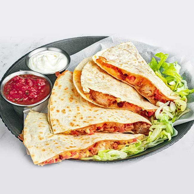 Shrimp BLT Quesadilla · A fusion of bold flavors, this grilled flour tortilla is chock full of fried shrimp, crumbled bacon, diced tomatoes and melty jack and cheddar cheese with sriracha ranch dressing. Served with a side of cool sour cream and salsa for dipping. (1340 cal.)