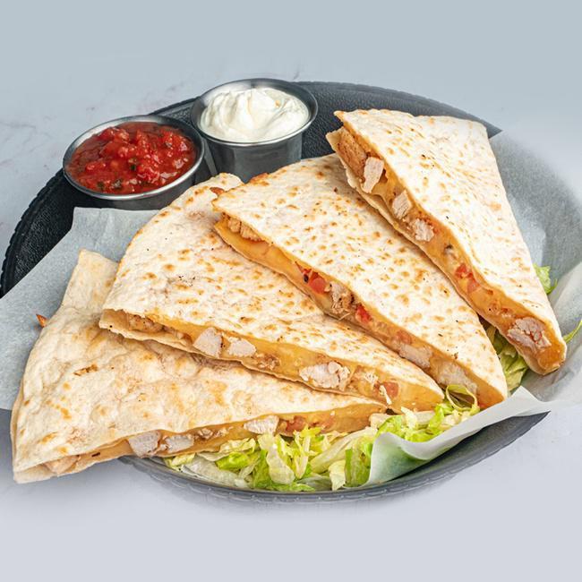 Monterey Chicken Quesadilla · Monterey jack and cheddar cheese melt together in a flour tortilla stuffed with tender grilled chicken and tomatoes. Served with sour cream and salsa for dipping. (990 cal.)