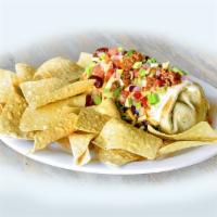 Smothered Burgerito · A seasoned all-beef pepper jack cheeseburger chopped and wrapped in a flour tortilla and top...