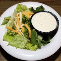 Side House Side Salad · Mixed Greens topped with diced tomatoes, shredded cheddar jack cheese and red onion rings.  ...