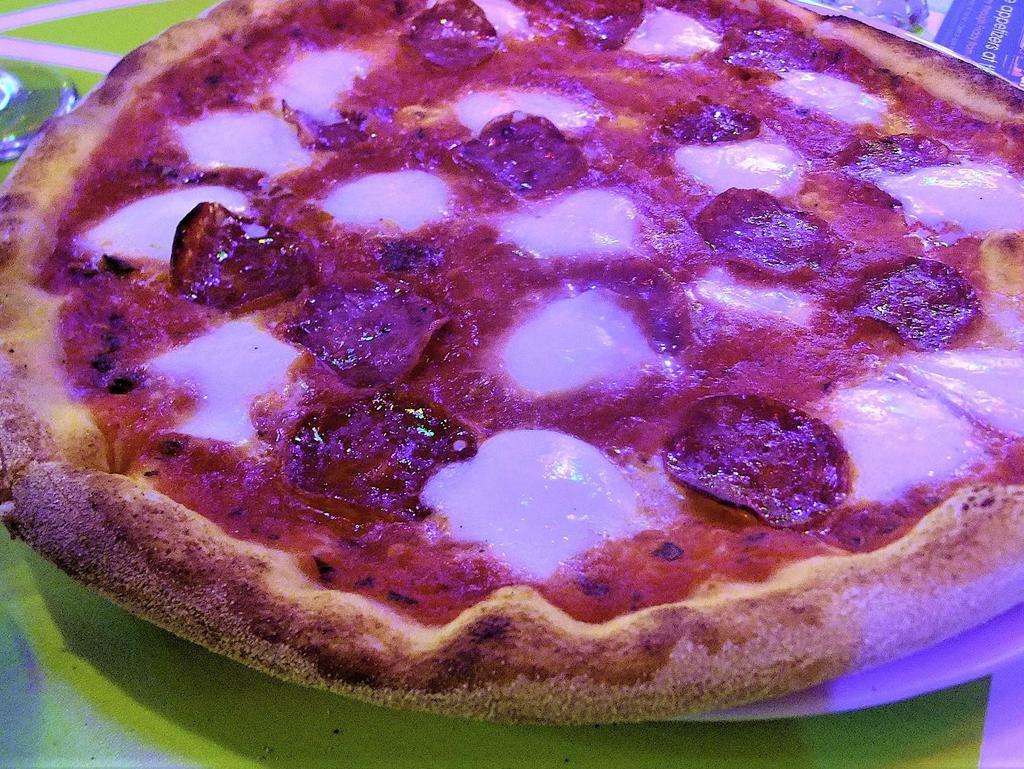 183. Pompei Pizza · Mozzarella fior di latte and oregano, topped with spicy salami.