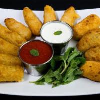 Sampler Platter (12pc) · 4 mozzarella sticks, 4 creamy cheese poppers & 4 roasted jalapeno poppers.