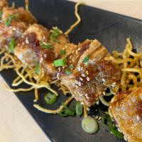 Crispy Tofu Bite · Tossed with special ginger garlic sauce, sesame seed, green onion along with crispy ramen no...