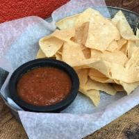 Chips and Cantina Salsa · Our fresh house-made tomato salsa. Served with corn tortilla chips. Spicy.