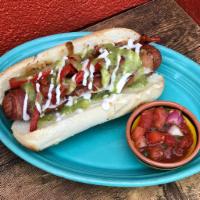 Tijuana Dog · Bacon wrapped hot dog topped with caramelized onion, fire roasted red peppers, creme fresca,...