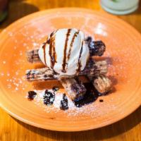 Churros · The classic flash-fried pastry Mexican treat and dusted with cinnamon sugar. Served with mis...