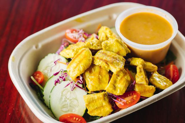 Satay Salad · Chicken marinated in special spices on a bed of mixed greens. Served with our homemade peanut salad dressing.