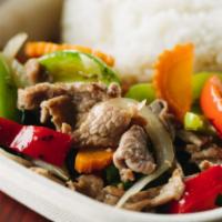 E9. Ginger Stir Fry · Stir fried fresh ginger, onions, scallions, baby corn, carrots, mushrooms and bell peppers c...