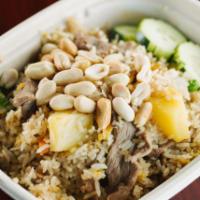 F2. Pineapple Fried Rice · Jasmine rice stir fried with chicken or beef, pineapples, carrots, scallions, onions, green ...