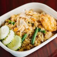 F7. Sweet Chili Fried Rice · Jasmine rice fried with bell peppers, onions, scallions, green beans, carrots, egg and a swe...