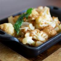 Caramelized Cauliflower · Caramelized cauliflower with toasted pine nuts, crispy mint leaves and lime sauce. Vegetaria...