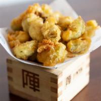 Brussels Sprouts Tempura · Crispy tempura brussels sprouts with white truffle oil. Vegetarian.