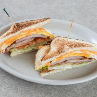 Egg Sandwich · 2 eggs with choice of bacon, sausage or ham on toast with cheese, lettuce, tomato, and mayon...