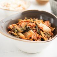 Kimchi · Kimchi is a national Korean dish consisting of fermented chili peppers on cabbage. Vegetarian.