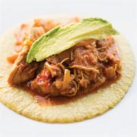 Tinga de Pollo · Shredded chicken breast braised with tomatoes, cabbage, chorizo and chipotle.  Served with c...