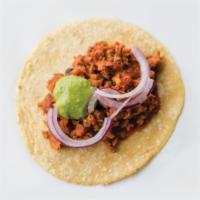 Chorizo · Mexican sausage en su jugo served with red onion, green serrano chile and chile arbol atop b...