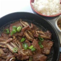 Galbi - Beef BBQ Short Rib · Bone-in Beef Short Rib BBQ with Traditional Korean Marinade. Served on the rice & with pickles
