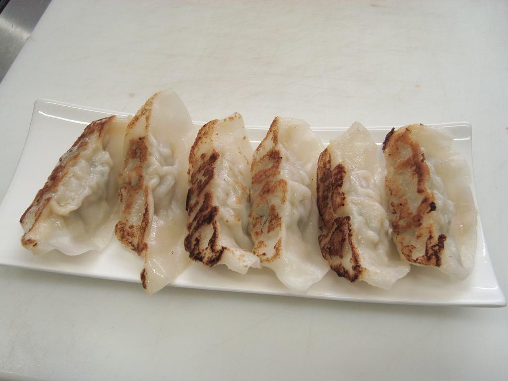 6 Piece Pan-Fried Gyoza · Choice of vegetable, shrimp or pork.