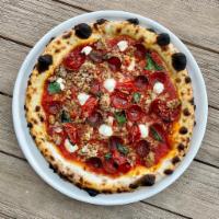 pepperoni + sausage pizza · ricotta + fresh mozzarella + tomato + garlic + basil