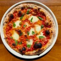 margherita pizza · tomato + house made mozzarella + basil