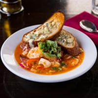 Red Chili Shrimp & Calamari · Sauteed in a spicy chili sauce with garlic, white wine, bell peppers, onions and fresh basil...