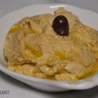 Hummus · Chick peas, tahini, garlic, olive oil and lemon juice spread.