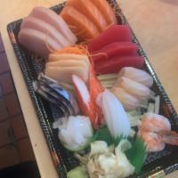 27. Sashimi Deluxe · 17 pieces perfect sashimi with sushi rice.