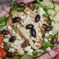 *Arcadian Chicken Salad · Sliced all-natural chicken breast marinated in our Italian dressing atop organic harvest ble...