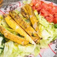 *Marinated Chicken Salad · Chopped lettuce, tomato, and cucumber topped with 4 oz. of chicken strips marinated in Grouc...