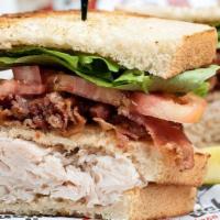 *Bacon & Turkey Club · 4 oz. serving of turkey breast and strips of crisp bacon, lettuce, and tomato, on your choic...