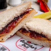 *PB&J · A childhood favorite, made to order on your choice of bread, served with Groucho's Famous Po...