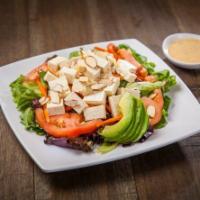 Tofu Salad.. · Spring mix topped with tomato, cucumber, avocado, almond and tomato served with house dressing