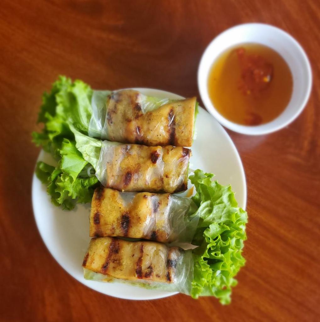 5A. Grill Chicken Salad Rolls · (Orders of 4) Ga nuong. Rice paper rolls with grilled chicken, vermicelli, bean sprouts lettuce and side of house sauce.