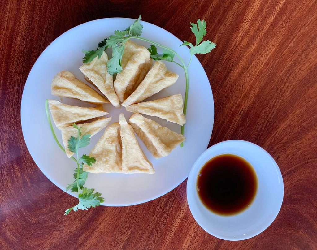 8A. Crispy Fried Tofu · (Orders of 4) Dau hu chien. Crispy fried tofu served with soy sauce.